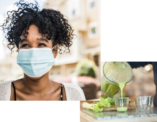smiling woman outside wearing a face mask