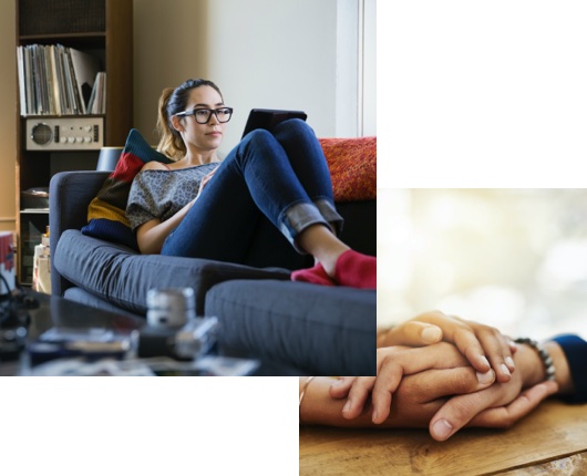 woman relaxing on a couch looking at a tablet